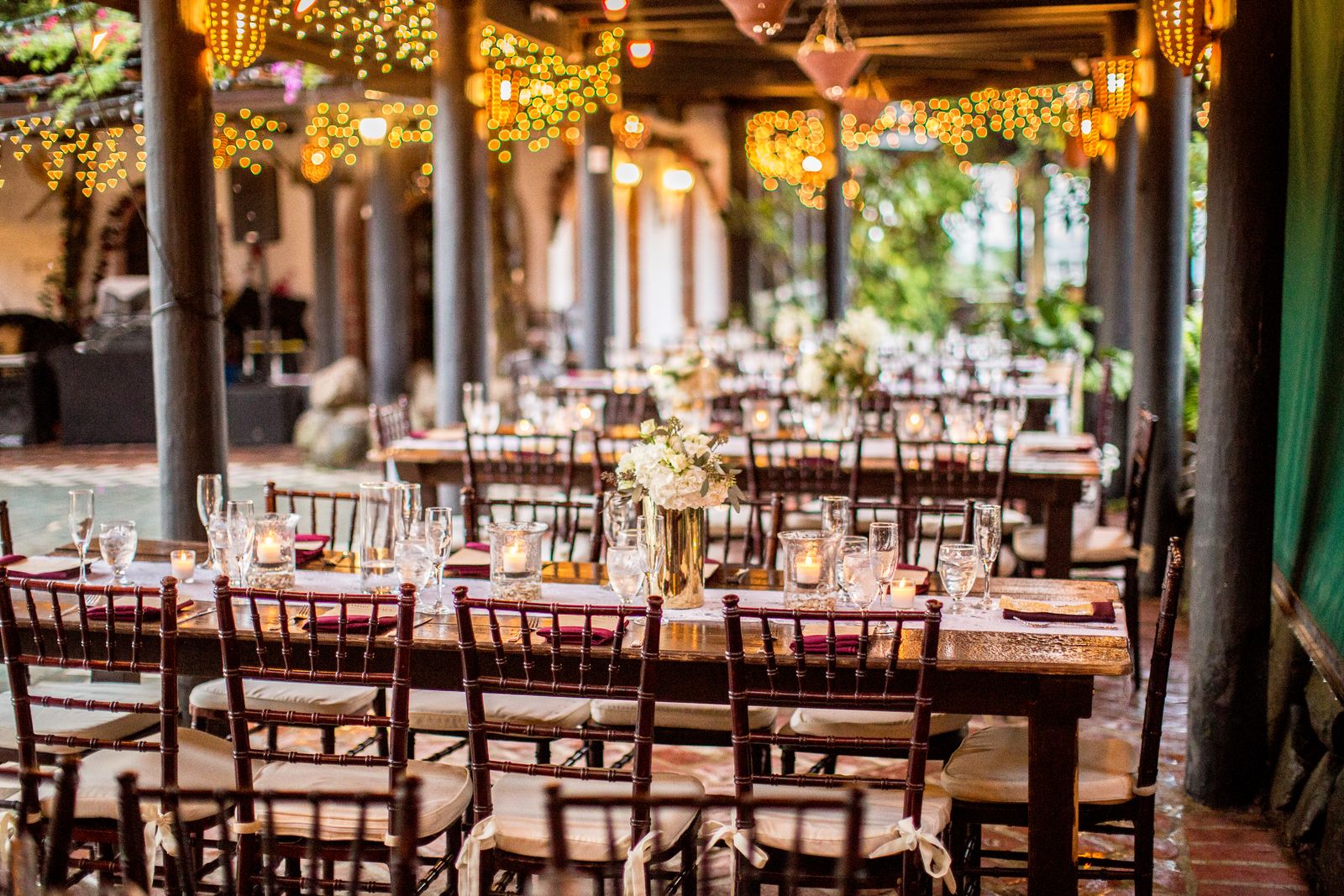 A candle-lit fundraiser dinner with set tables